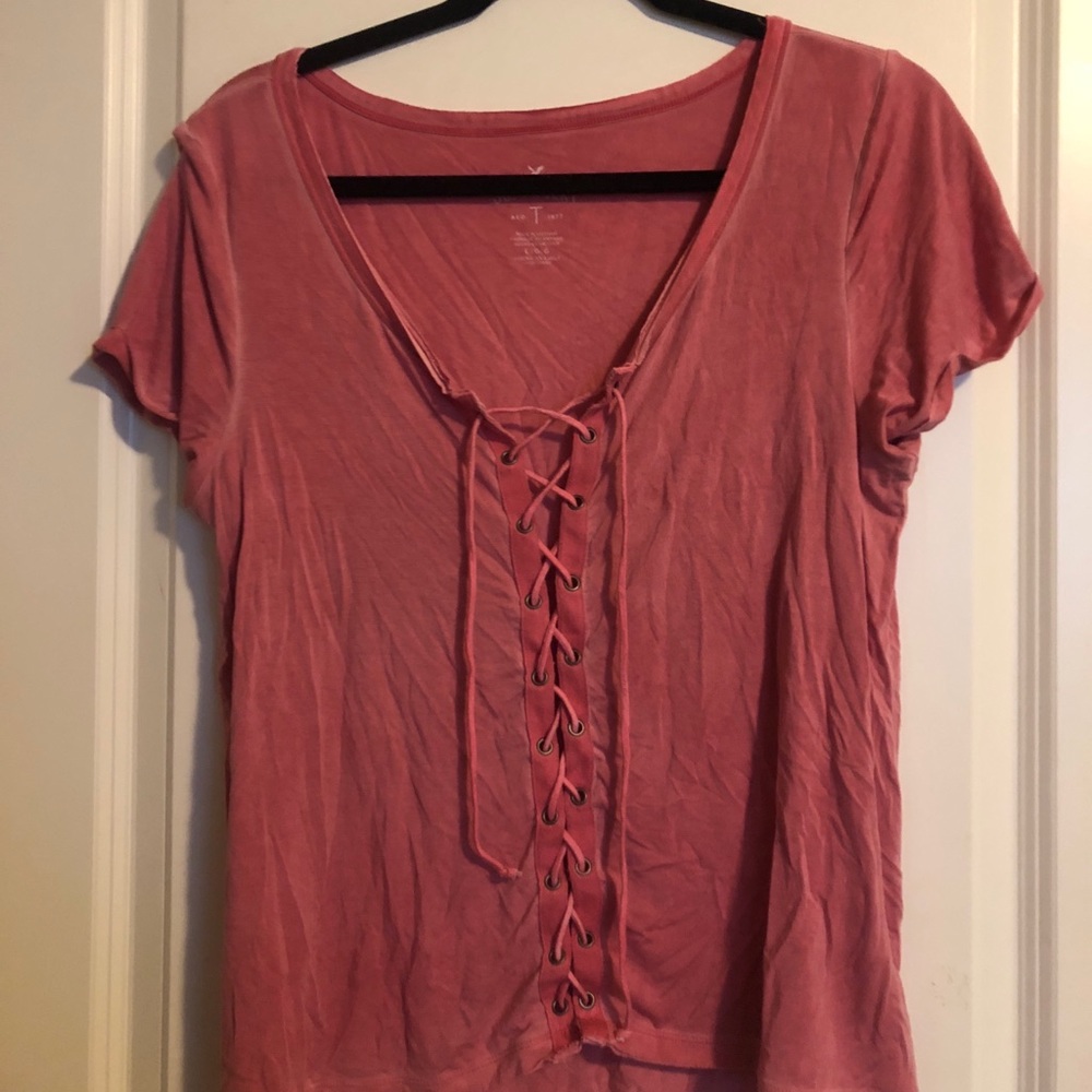 Lace up red stone washed American eagle top